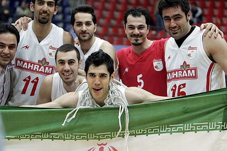 Iran's Mahram players holds their national flag and celebrate after their win over Jordan's Zain in the final game of West Asian Clubs Championship basketball game in Amman March 21,2009.